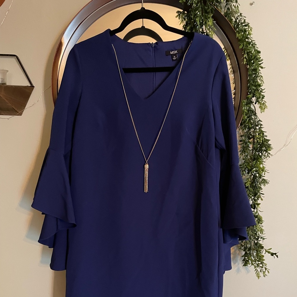 Blue bell sleeve dress it's right above the knee. I am 5'7. Only worn once.